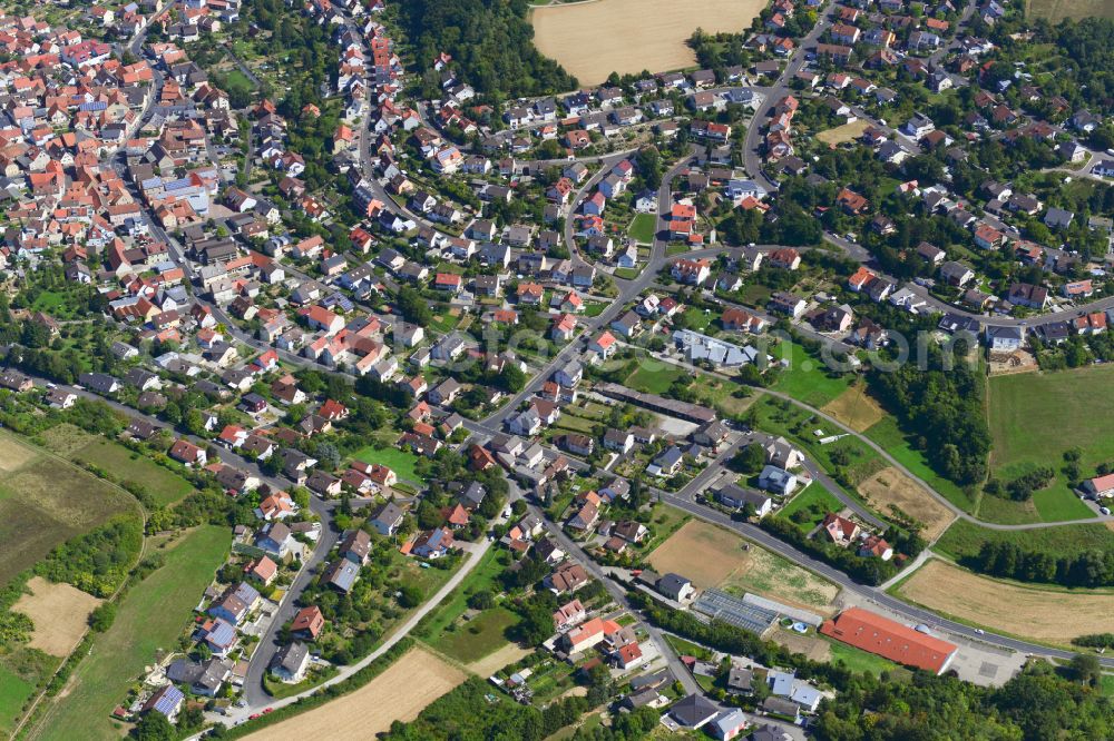 Aerial image Güntersleben - Single-family residential area of settlement on the edge of agricultural fields in Güntersleben in the state Bavaria, Germany