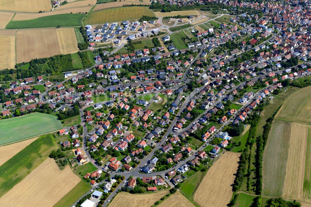 Güntersleben from above - Single-family residential area of settlement on the edge of agricultural fields in Güntersleben in the state Bavaria, Germany
