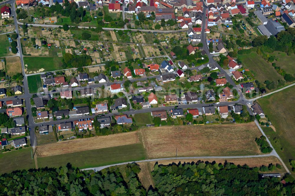 Aerial photograph Greußenheim - Single-family residential area of settlement on the edge of agricultural fields in Greußenheim in the state Bavaria, Germany