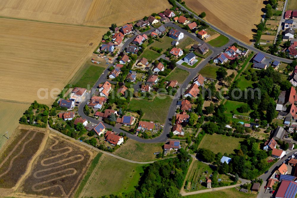 Hausen from above - Single-family residential area of settlement on the edge of agricultural fields in Hausen in the state Bavaria, Germany