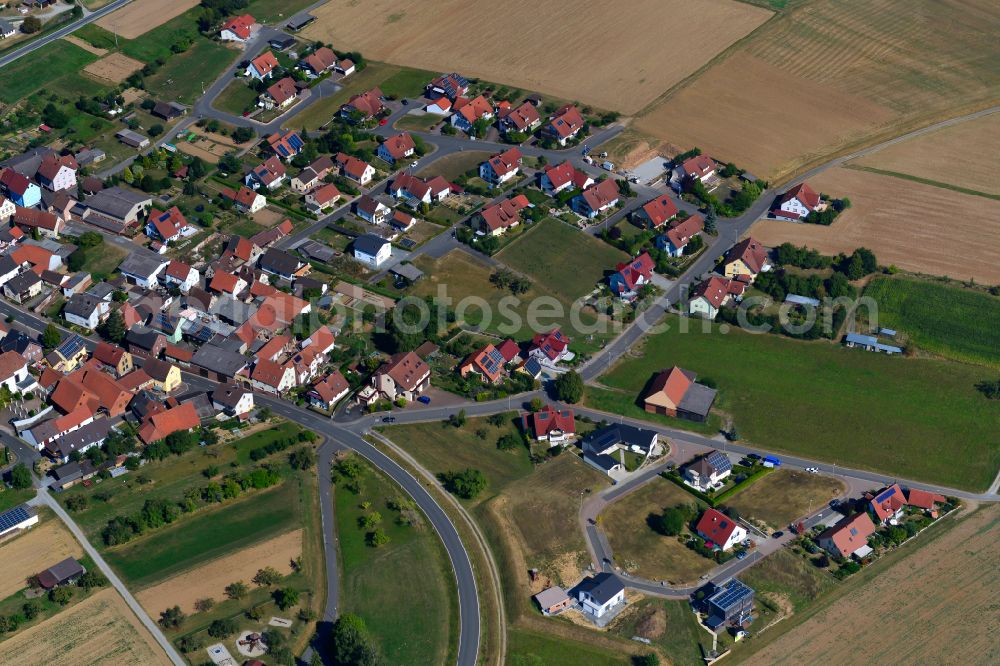 Aerial image Holzkirchhausen - Single-family residential area of settlement on the edge of agricultural fields in Holzkirchhausen in the state Bavaria, Germany