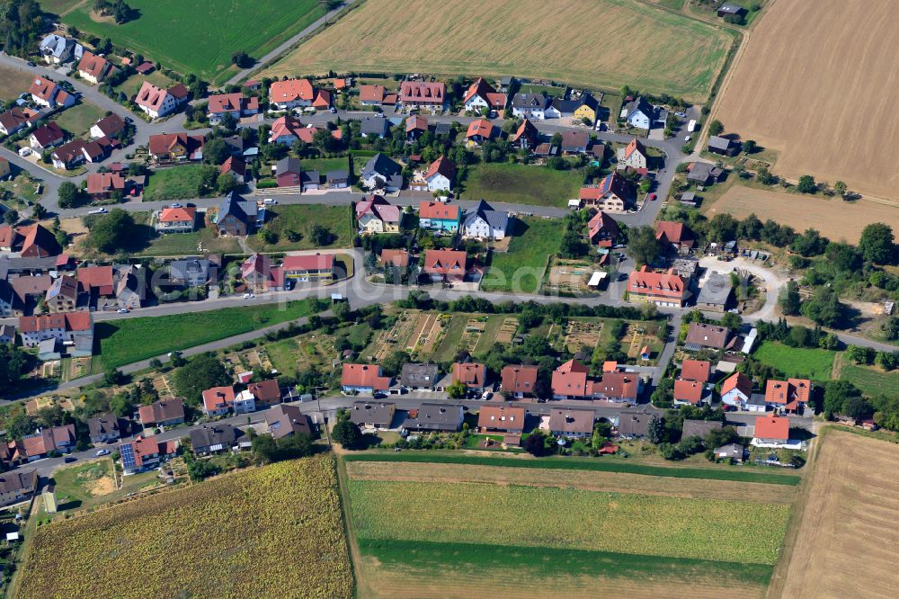 Oberaltertheim from above - Single-family residential area of settlement on the edge of agricultural fields in Oberaltertheim in the state Bavaria, Germany