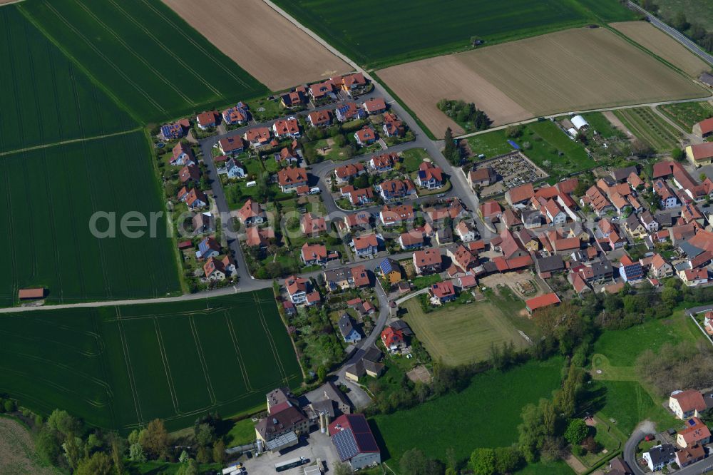 Aerial image Obervolkach - Single-family residential area of settlement on the edge of agricultural fields in Obervolkach in the state Bavaria, Germany