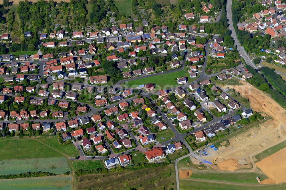 Reichenberg from the bird's eye view: Single-family residential area of settlement on the edge of agricultural fields in Reichenberg in the state Bavaria, Germany