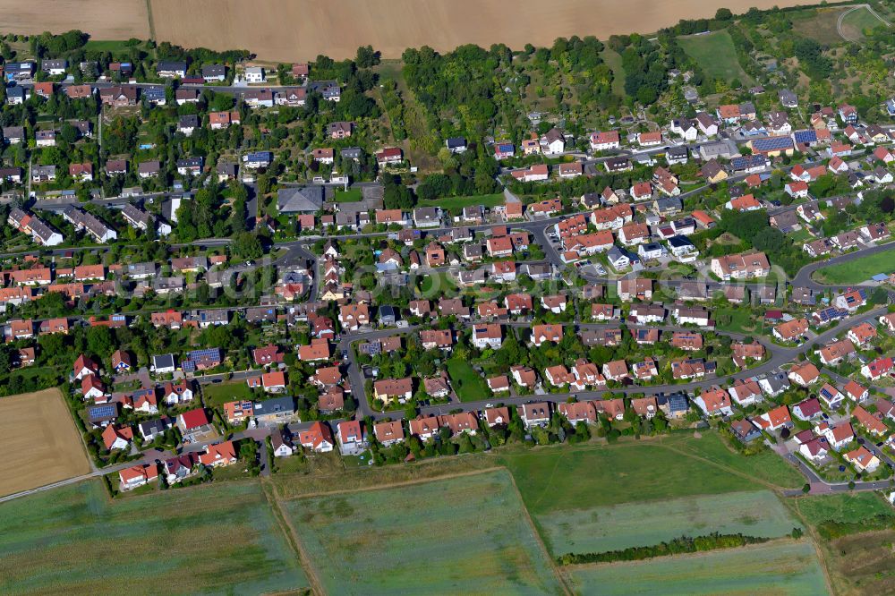 Aerial image Reichenberg - Single-family residential area of settlement on the edge of agricultural fields in Reichenberg in the state Bavaria, Germany