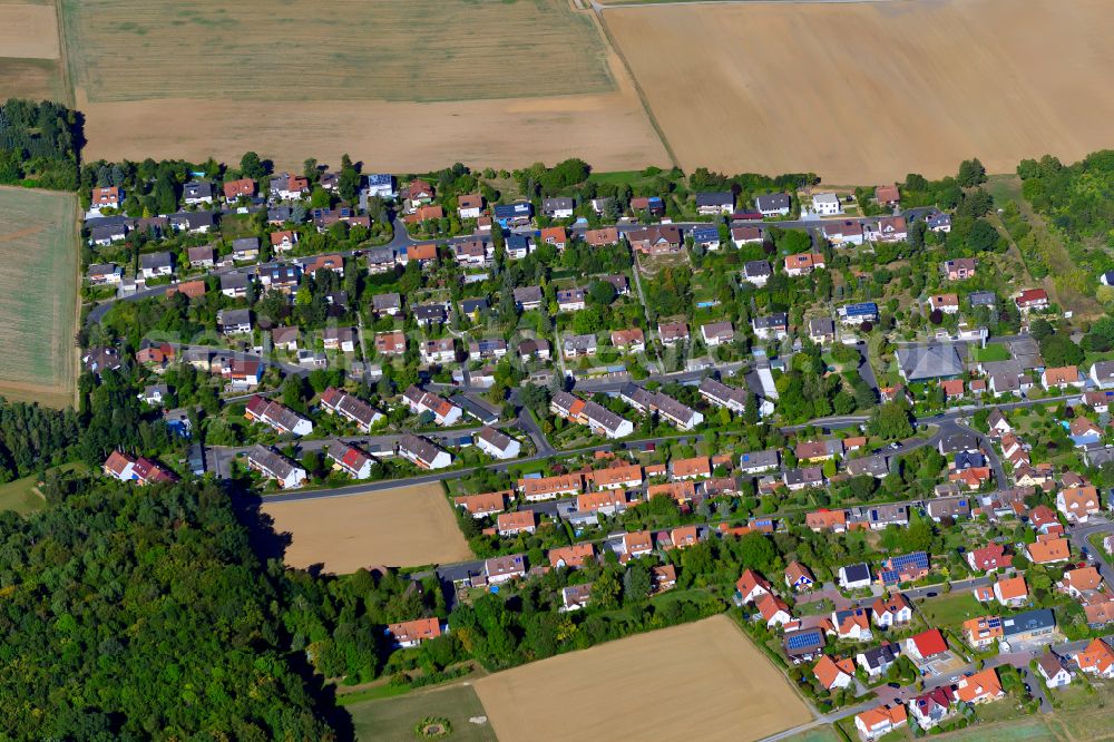 Aerial photograph Reichenberg - Single-family residential area of settlement on the edge of agricultural fields in Reichenberg in the state Bavaria, Germany