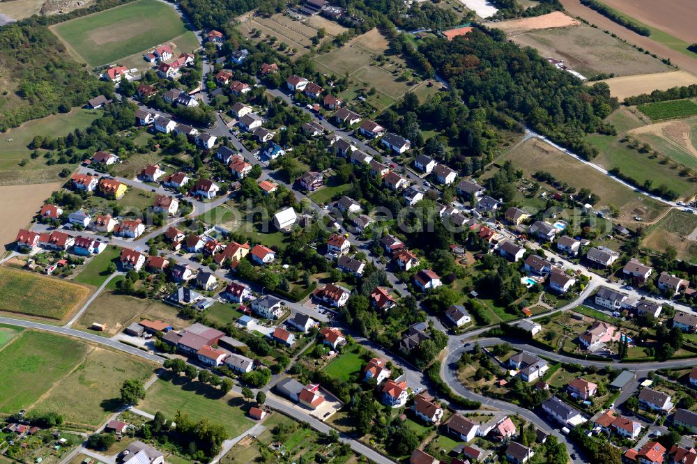 Aerial image Remlingen - Single-family residential area of settlement on the edge of agricultural fields in Remlingen in the state Bavaria, Germany