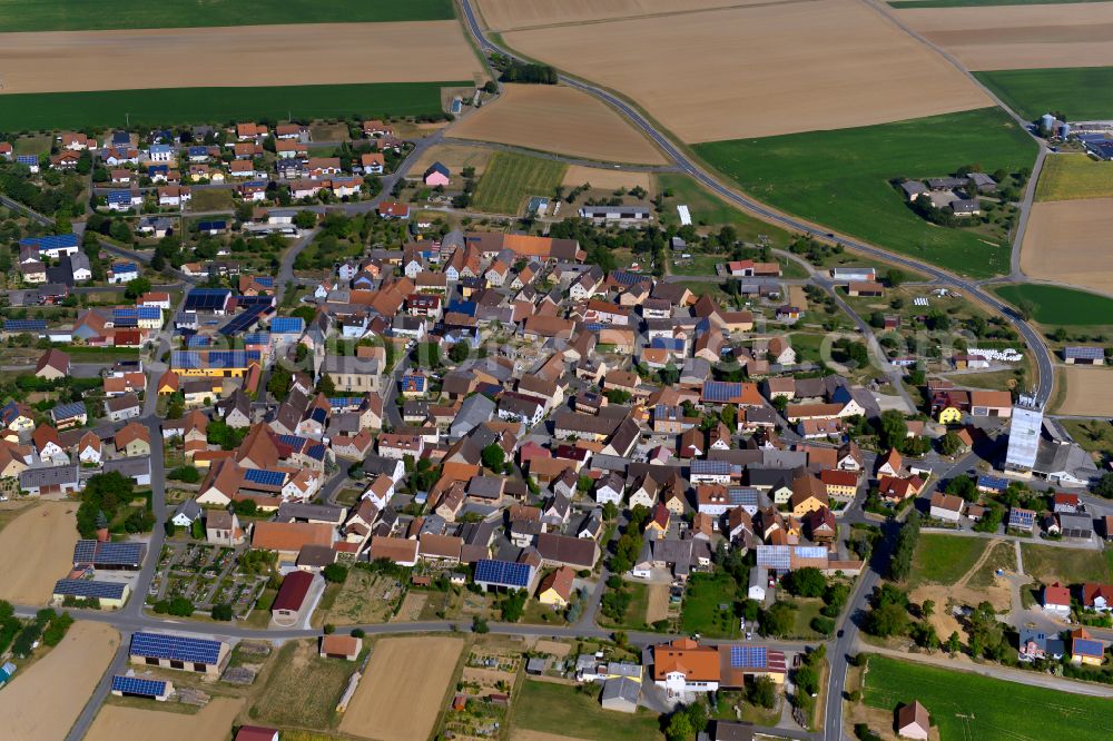 Riedenheim from above - Single-family residential area of settlement on the edge of agricultural fields in Riedenheim in the state Bavaria, Germany