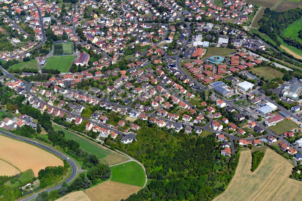 Aerial image Rimpar - Single-family residential area of settlement on the edge of agricultural fields in Rimpar in the state Bavaria, Germany