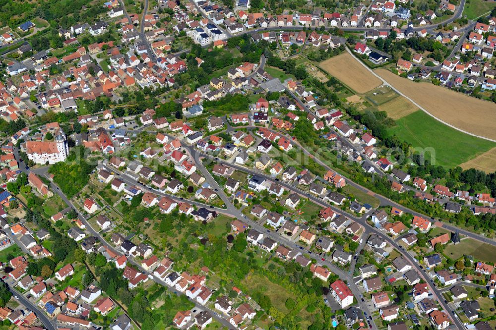 Rimpar from the bird's eye view: Single-family residential area of settlement on the edge of agricultural fields in Rimpar in the state Bavaria, Germany