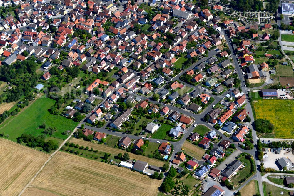 Aerial image Rimpar - Single-family residential area of settlement on the edge of agricultural fields in Rimpar in the state Bavaria, Germany