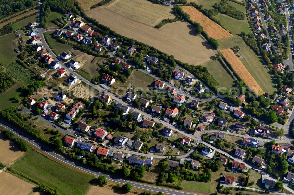 Aerial image Röttingen - Single-family residential area of settlement on the edge of agricultural fields in Röttingen in the state Bavaria, Germany