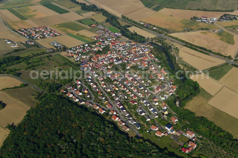 Tauberrettersheim from above - Single-family residential area of settlement on the edge of agricultural fields in Tauberrettersheim in the state Bavaria, Germany