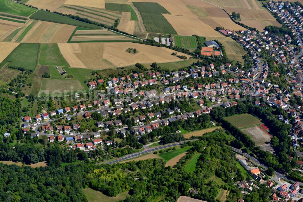 Versbach from the bird's eye view: Single-family residential area of settlement on the edge of agricultural fields in Versbach in the state Bavaria, Germany