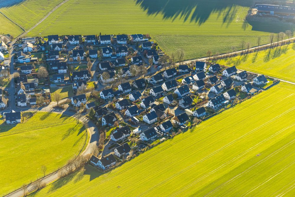 Eslohe (Sauerland) from the bird's eye view: Single-family residential area of settlement on Sankt-Rochus-Weg - Im Westenfeld in Eslohe (Sauerland) in the state North Rhine-Westphalia, Germany