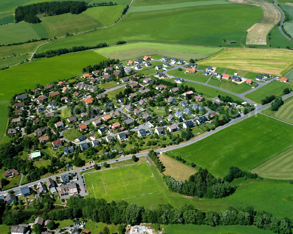 Förbau from the bird's eye view: Residential areas on the edge of agricultural land in Förbau in the state Bavaria, Germany