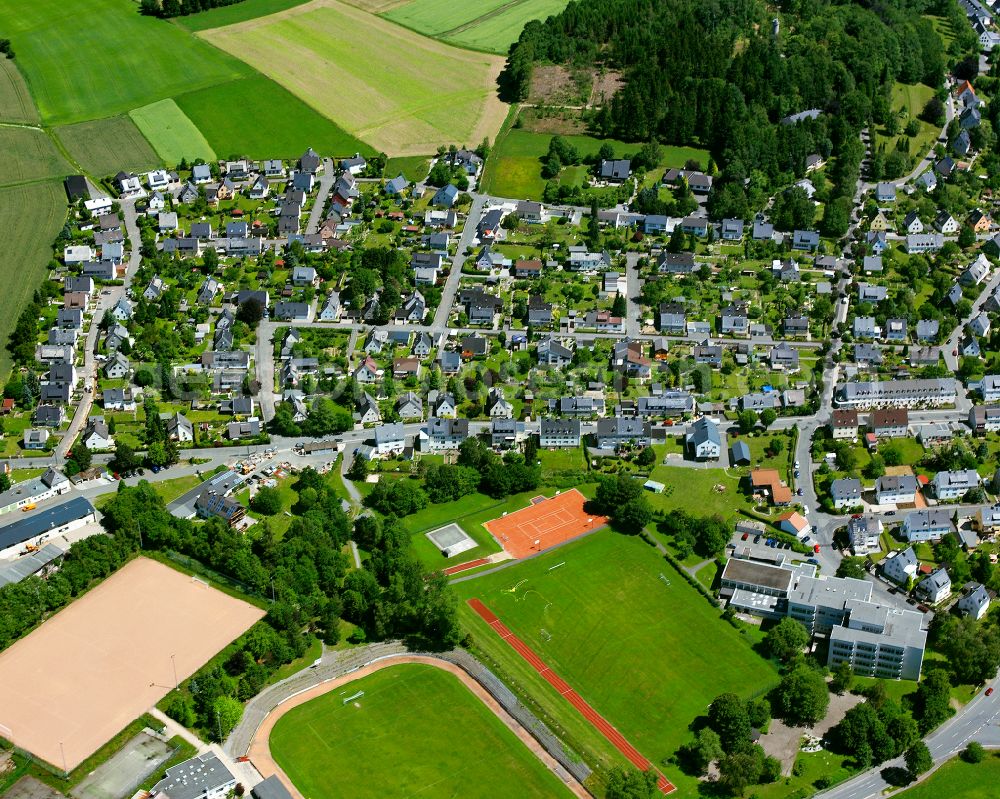 Aerial image Kleinschwarzenbach - Residential areas on the edge of agricultural land in Kleinschwarzenbach in the state Bavaria, Germany
