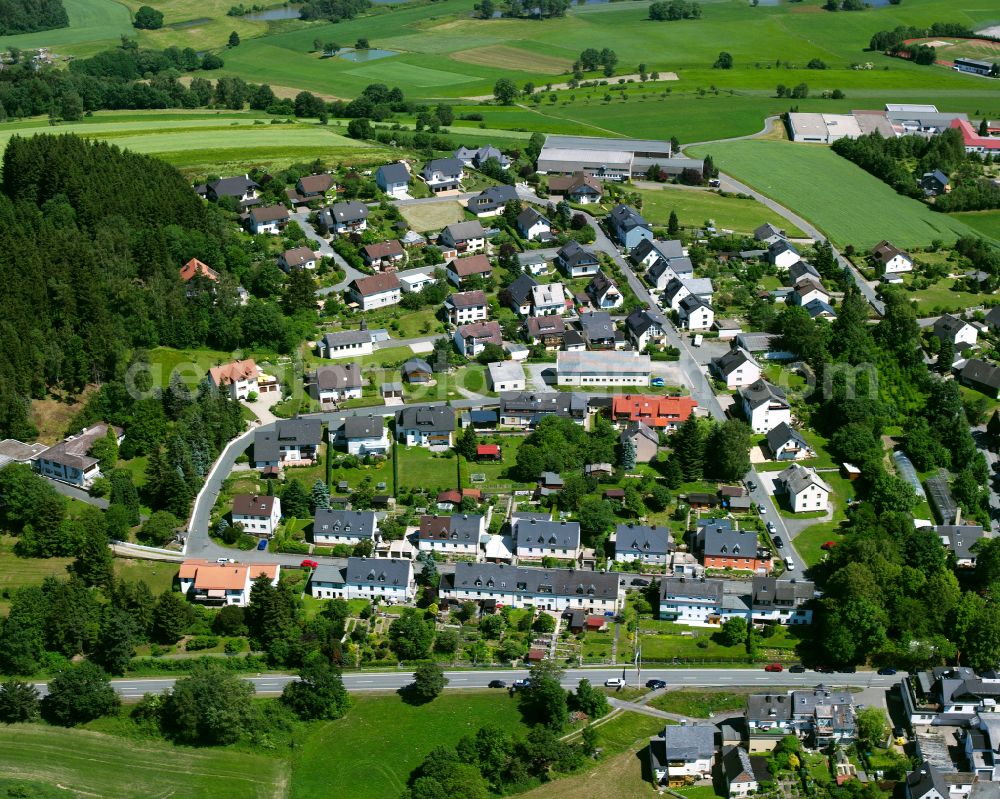 Schauenstein from above - Residential areas on the edge of agricultural land in Schauenstein in the state Bavaria, Germany
