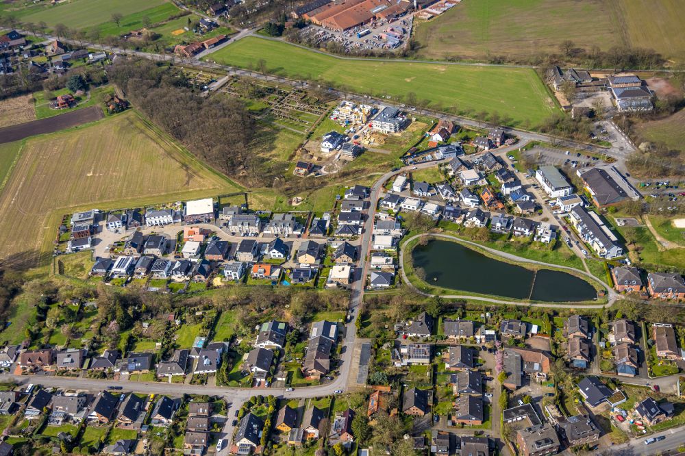 Aerial photograph Schermbeck - Residential areas on the edge of agricultural land on street An der Vosskuhle in Schermbeck in the state North Rhine-Westphalia, Germany