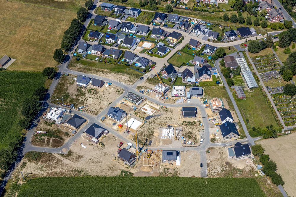 Walstedde from the bird's eye view: Residential areas on the edge of agricultural land in Walstedde in the state North Rhine-Westphalia, Germany