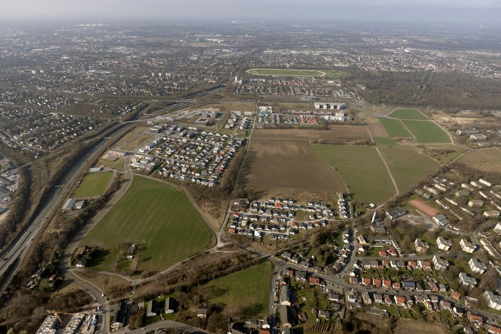 Dortmund from the bird's eye view: Panoramic view at the residential area at the Londoner Bogen in the urban district Schüren and the city of Dortmund in the federal state North Rhine-Westphalia. In addition, the racecourse Dortmund is seen