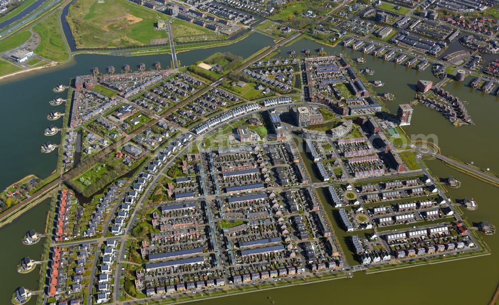 Heerhugowaard from above - Residential area of the multi-family house settlement in Meer van Luna in Heerhugowaard in Noord-Holland, Netherlands