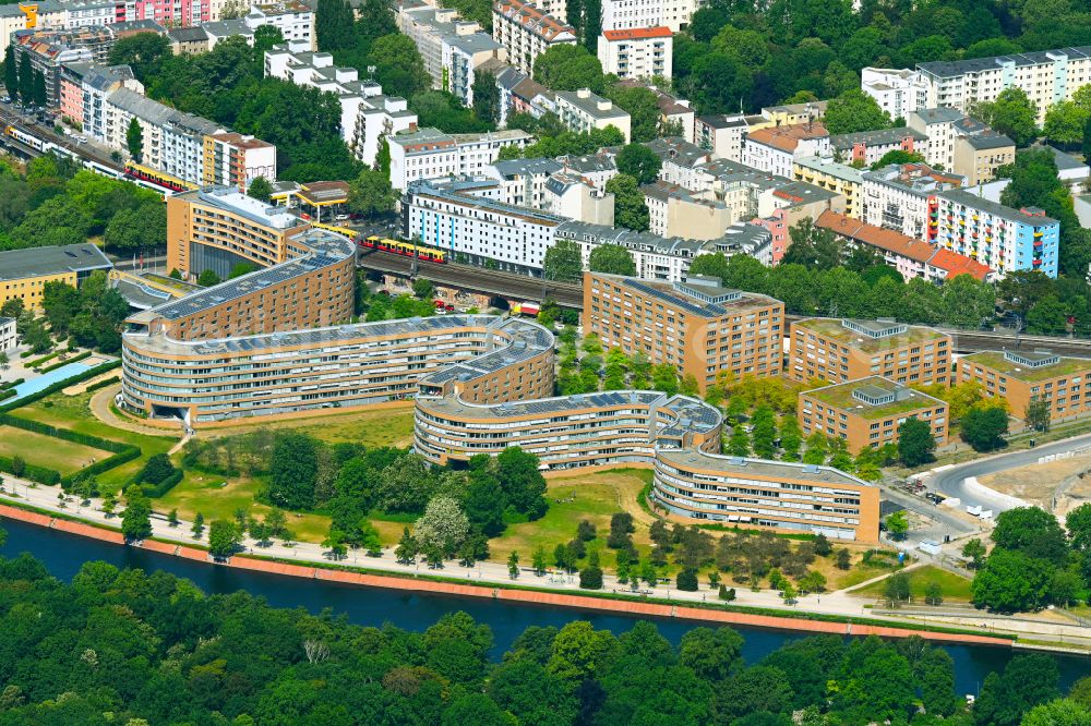 Berlin from above - Residential area of a multi-family house settlement on the bank and river of Spree River in the district Moabit in Berlin, Germany