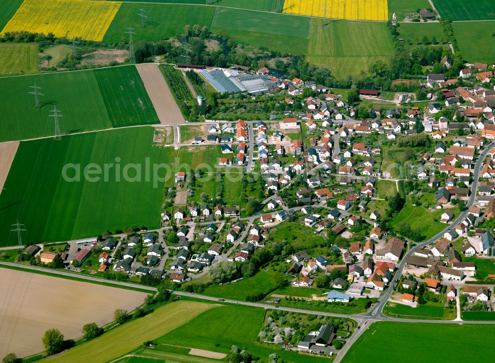 Dellmensingen from the bird's eye view: Residential area - mixed development of a multi-family housing estate and single-family housing estate in Dellmensingen in the state Baden-Wuerttemberg, Germany