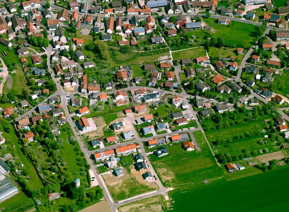 Aerial image Dellmensingen - Residential area - mixed development of a multi-family housing estate and single-family housing estate in Dellmensingen in the state Baden-Wuerttemberg, Germany