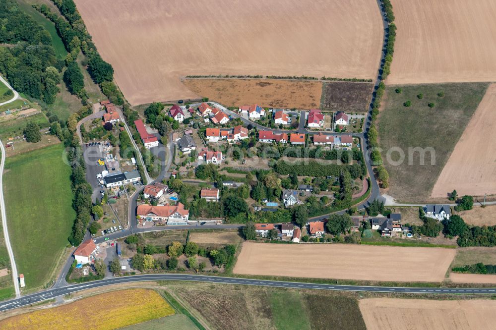 Gössenheim from the bird's eye view: Residential area - mixed development of a multi-family housing estate and single-family housing estate in Gössenheim in the state Bavaria, Germany