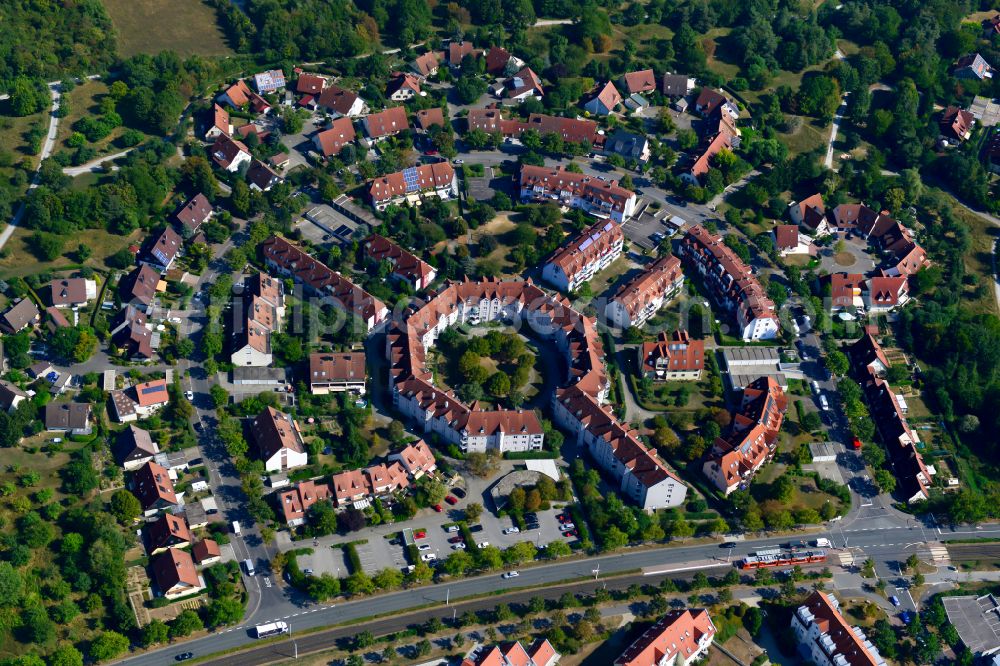 Heuchelhof from the bird's eye view: Residential area - mixed development of a multi-family housing estate and single-family housing estate in Heuchelhof in the state Bavaria, Germany