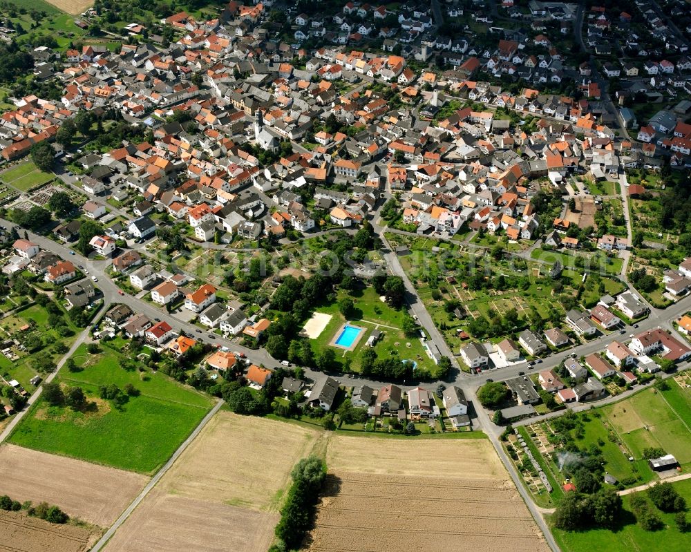 Aerial image Holzheim - Residential area - mixed development of a multi-family housing estate and single-family housing estate in Holzheim in the state Hesse, Germany