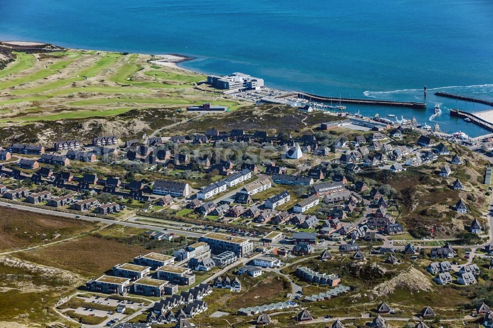 Hörnum (Sylt) from the bird's eye view: Residential area - mixed development of a multi-family housing estate and single-family housing estate in Hoernum on Sylt in the state Schleswig-Holstein, Germany