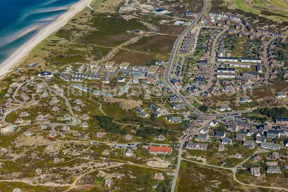 Hörnum (Sylt) from the bird's eye view: Residential area - mixed development of a multi-family housing estate and single-family housing estate in Hoernum on Sylt in the state Schleswig-Holstein, Germany