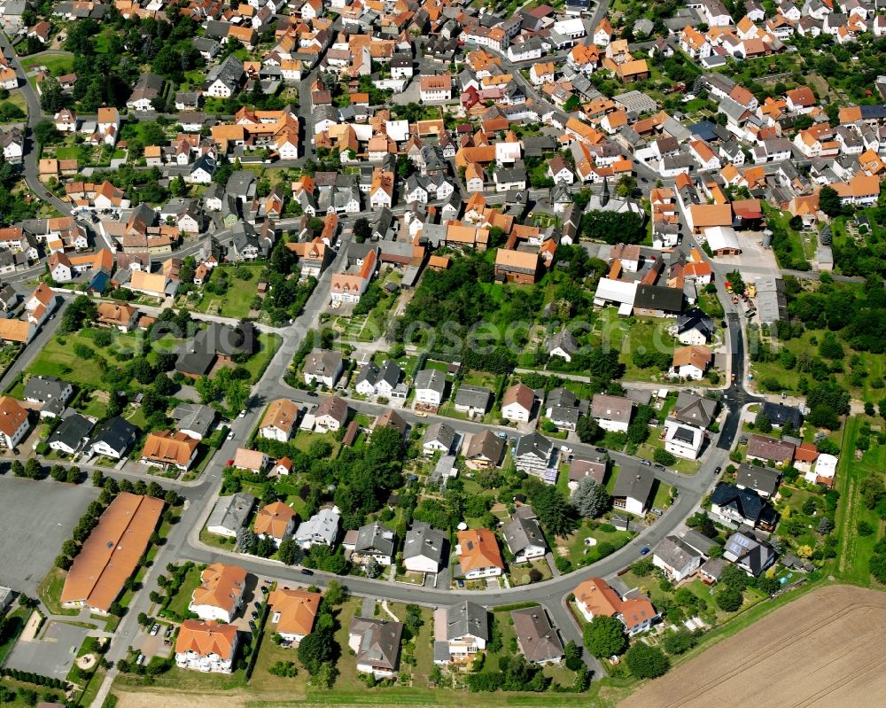 Aerial image Lützellinden - Residential area - mixed development of a multi-family housing estate and single-family housing estate in Lützellinden in the state Hesse, Germany