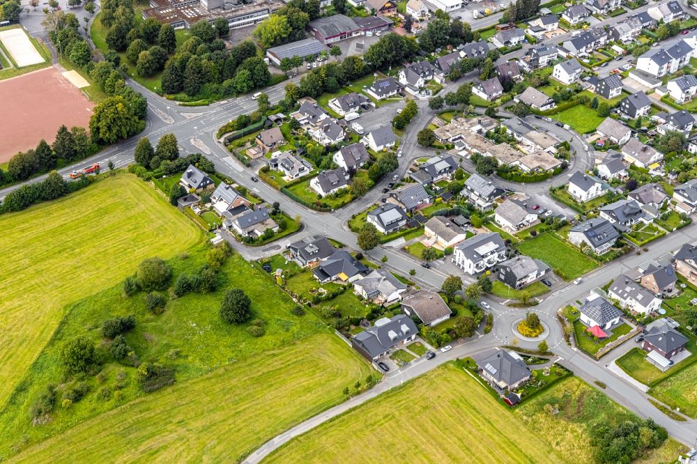 Aerial image Brilon - Residential area - mixed development of a multi-family housing estate and single-family housing estate on Mueggenborn - Derkerborn - Altenbuerener in Brilon in the state North Rhine-Westphalia, Germany