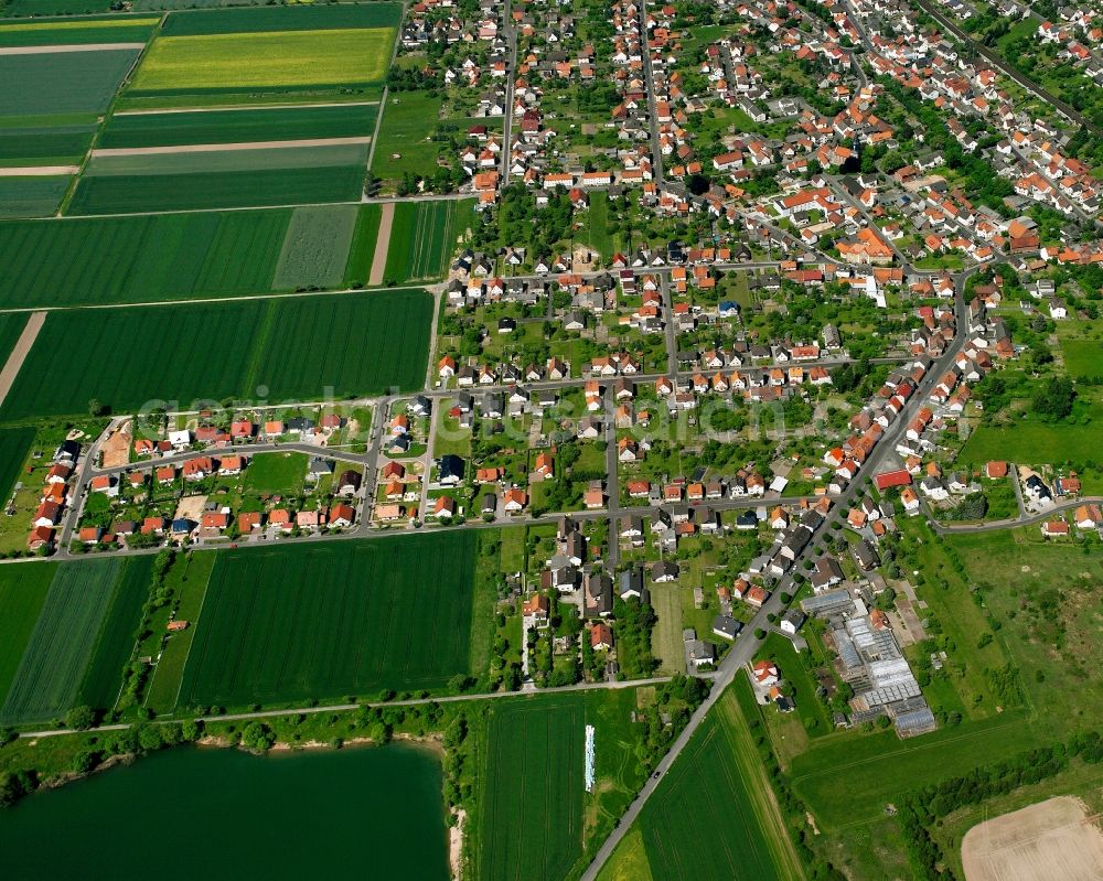 Aerial photograph Obersuhl - Residential area - mixed development of a multi-family housing estate and single-family housing estate in Obersuhl in the state Hesse, Germany
