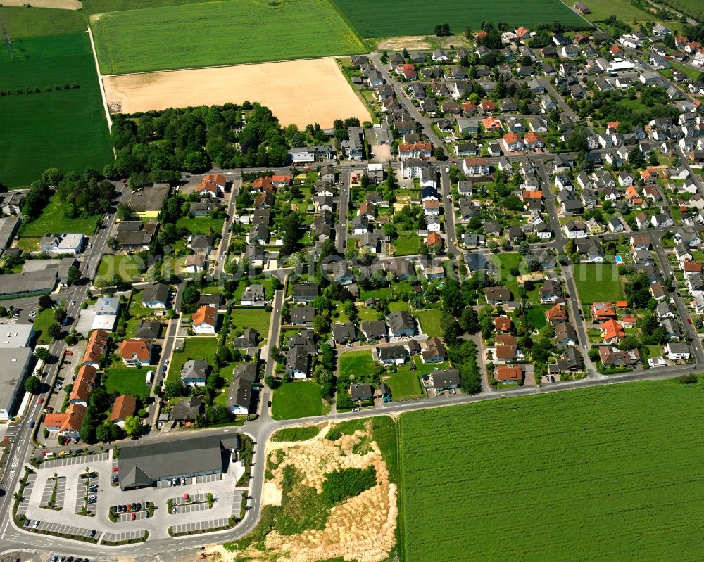 Aerial image Offheim - Residential area - mixed development of a multi-family housing estate and single-family housing estate in Offheim in the state Hesse, Germany