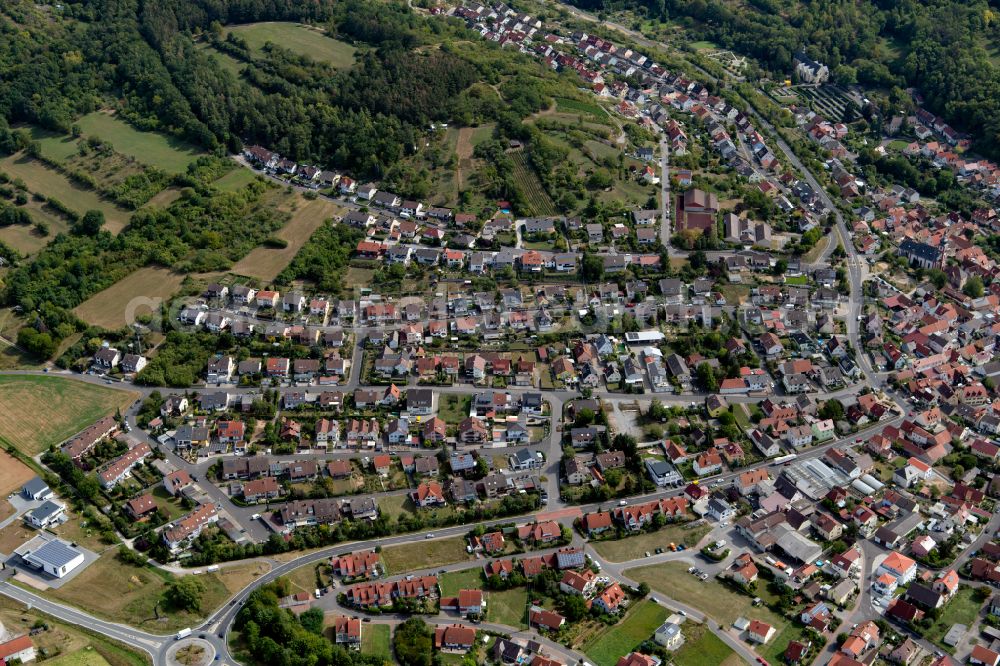 Retzbach from the bird's eye view: Residential area - mixed development of a multi-family housing estate and single-family housing estate in Retzbach in the state Bavaria, Germany