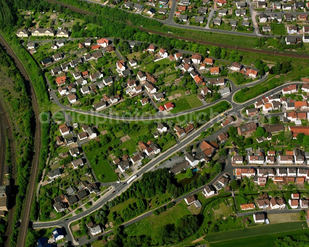 Weiterode from above - Residential area - mixed development of a multi-family housing estate and single-family housing estate in Weiterode in the state Hesse, Germany