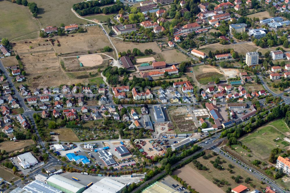 Aerial image Wombach - Residential area - mixed development of a multi-family housing estate and single-family housing estate in Wombach in the state Bavaria, Germany