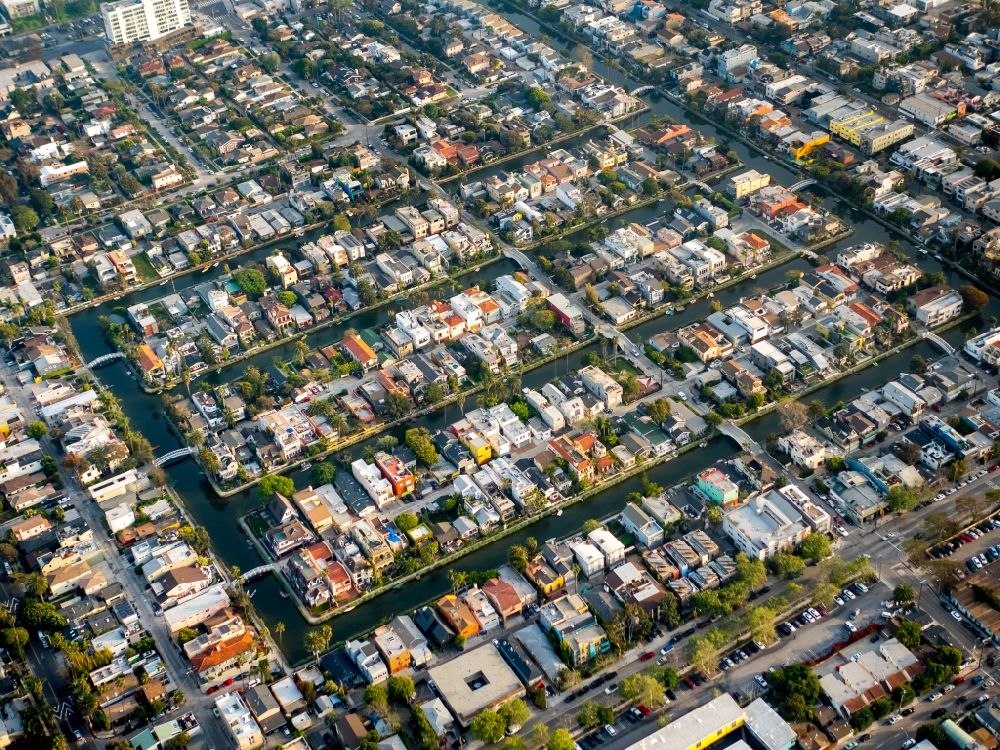 Los Angeles from the bird's eye view: Residential area amidst water canals in the Venice neighborhood of Los Angeles in California, USA. Venice is known for its small rivers and canals such as the ones along Dell Ave
