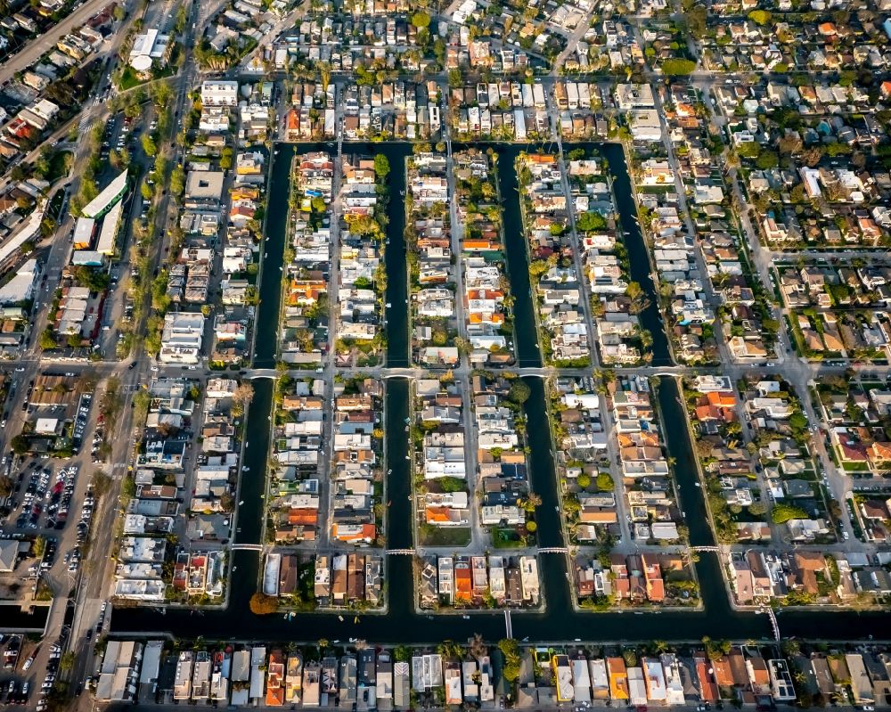 Aerial photograph Los Angeles - Residential area amidst water canals in the Venice neighborhood of Los Angeles in California, USA. Venice is known for its small rivers and canals such as the ones along Dell Ave