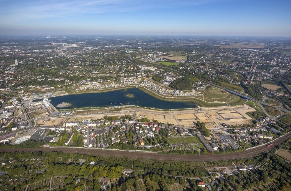 Dortmund from the bird's eye view: View of the Lake Phoenix in Dortmund in the state North Rhine-Westphalia. The Lake Phoenix is an artificial lake on the area of the former steelwork Phoenix-Ost. Together with the circumjacent areal a housing area and a recreational area will be created