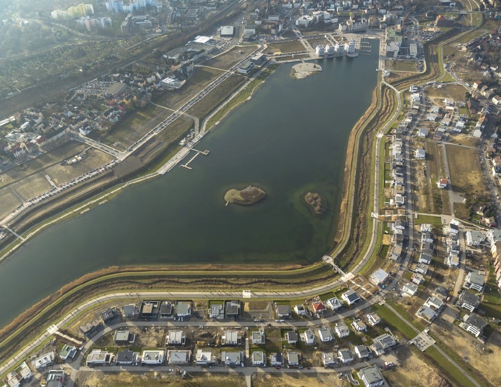Aerial image Dortmund - View of the Lake Phoenix in Dortmund in the state North Rhine-Westphalia. The Lake Phoenix is an artificial lake on the area of the former steelwork Phoenix-Ost. Together with the circumjacent areal a housing area and a recreational area will be created