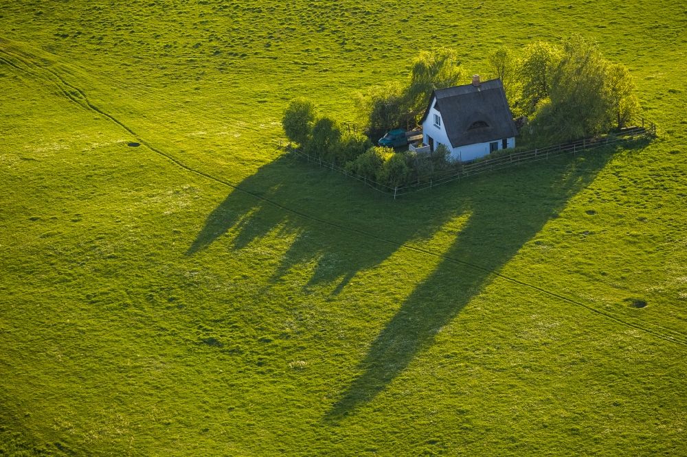 Ludorf from the bird's eye view: Residential house with long shadows in the community Ludorf in Mecklenburg-Western Pomerania
