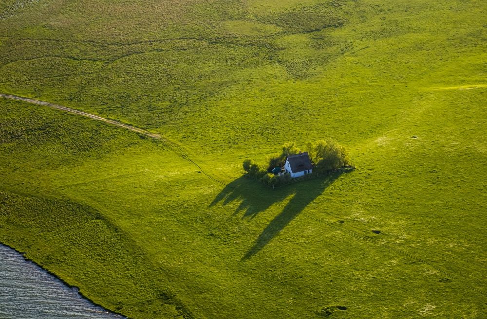 Aerial image Ludorf - Residential house with long shadows in the community Ludorf in Mecklenburg-Western Pomerania