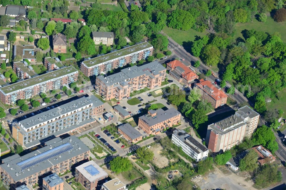 Berlin from the bird's eye view: Residential area and historic buildings An der Filmfabrik and Am Werksgarten in the Treptow-Koepnick district of Berlin. The Theatre Coepnick is located on site. The area is located adjacent to the Bellevue-Park