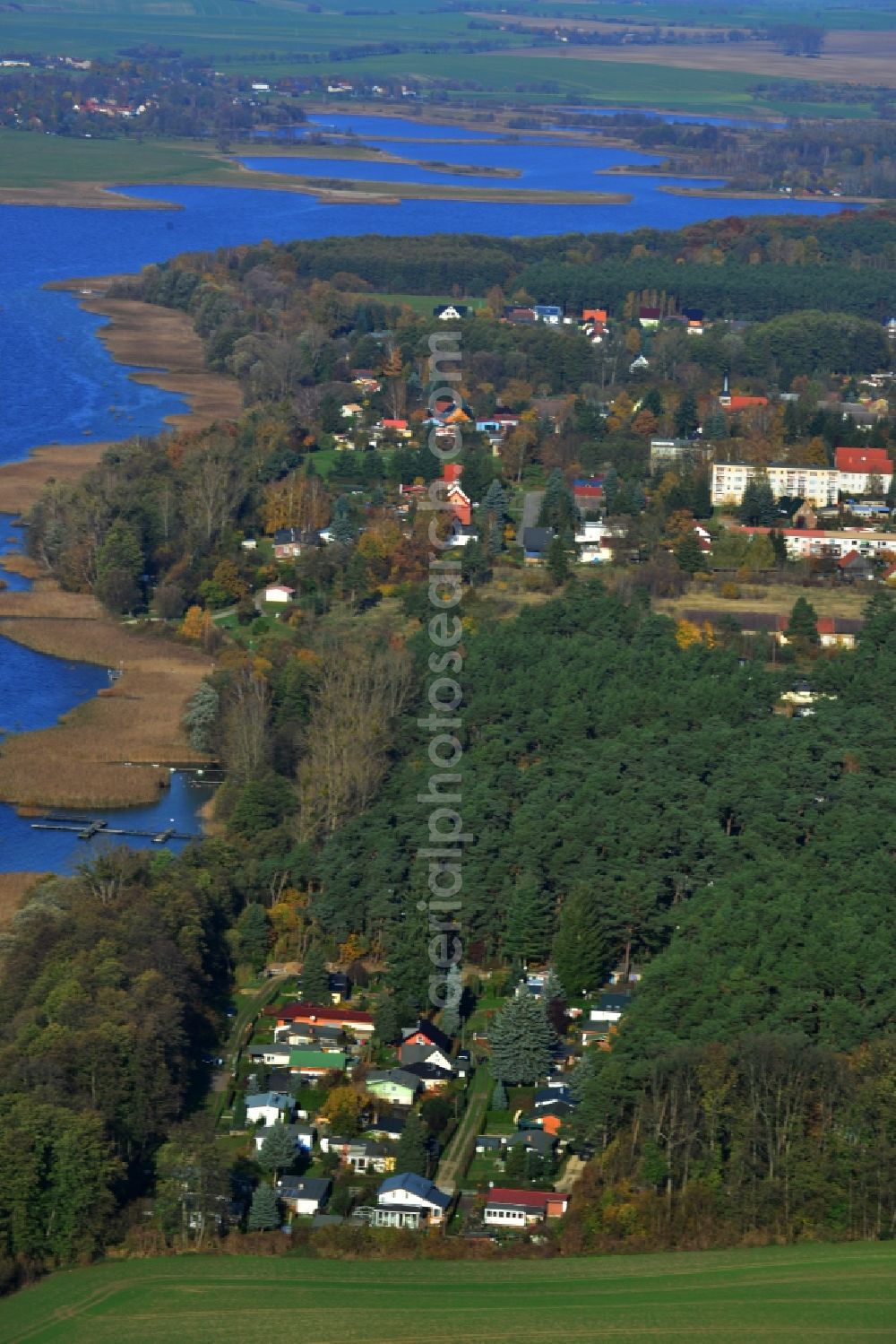Oberuckersee Warnitz from above - View of houses at the bank of the lake Oberuckersee in the district Warnitz in the state Brandenburg