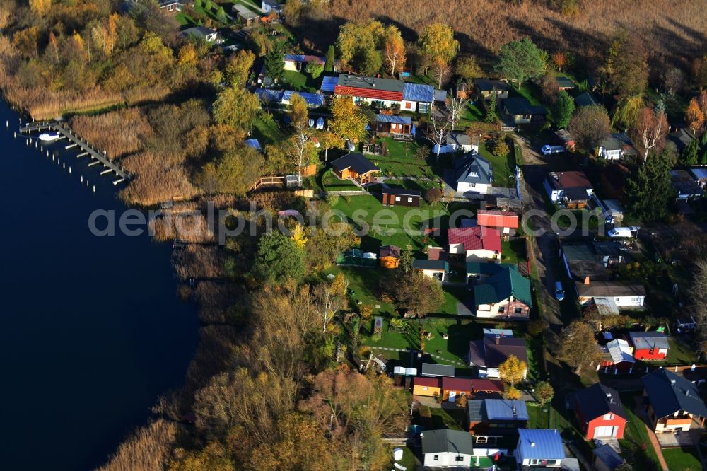 Aerial image Oberuckersee Warnitz - View of houses at the bank of the lake Oberuckersee in the district Warnitz in the state Brandenburg